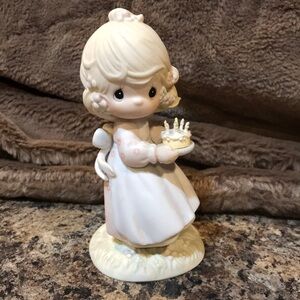 Precious moments figurine “May your birthday be a blessing”.